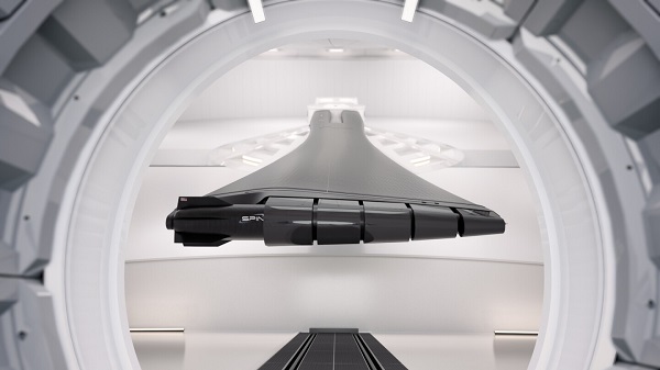 Render zobrazuje ľahkú nosnú raketu držanú na konci ramena z uhlíkových vlákien vo vnútri oceľovej vákuovej komory s priemerom 300 stôp (91,44 metra). V tejto vákuovej komore sa toto rameno roztočí na neuveriteľné hypersonické rýchlosti predtým, ako sa nosná raketa uvoľní cez otvor smerujúci k nebu.